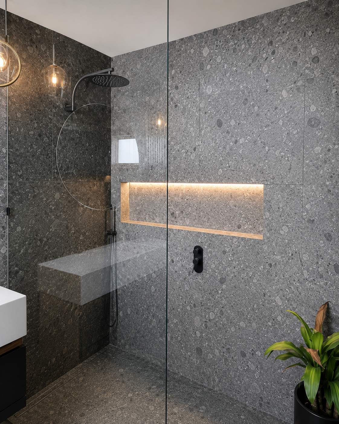 Toorak ensuite with terrazzo-effect porcelain to walls and floor, timber-lined niche and matt black tapware