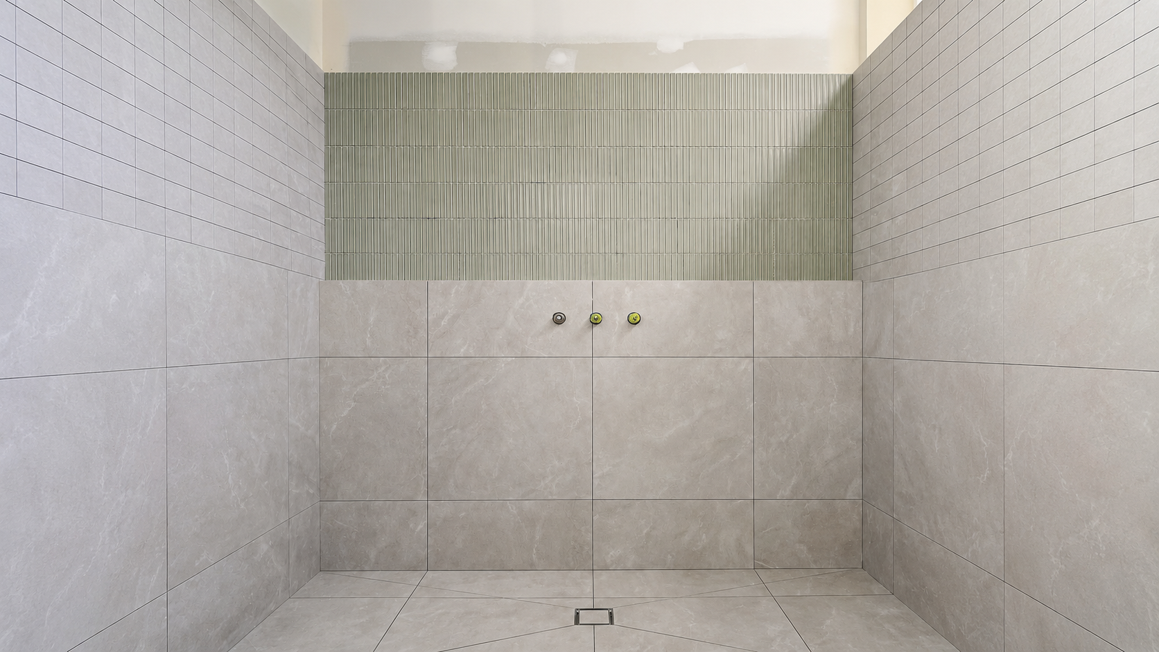 Luxury bathroom with full-height tiling