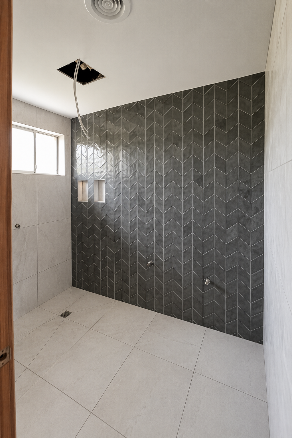 Full height wall tiling in honed marble